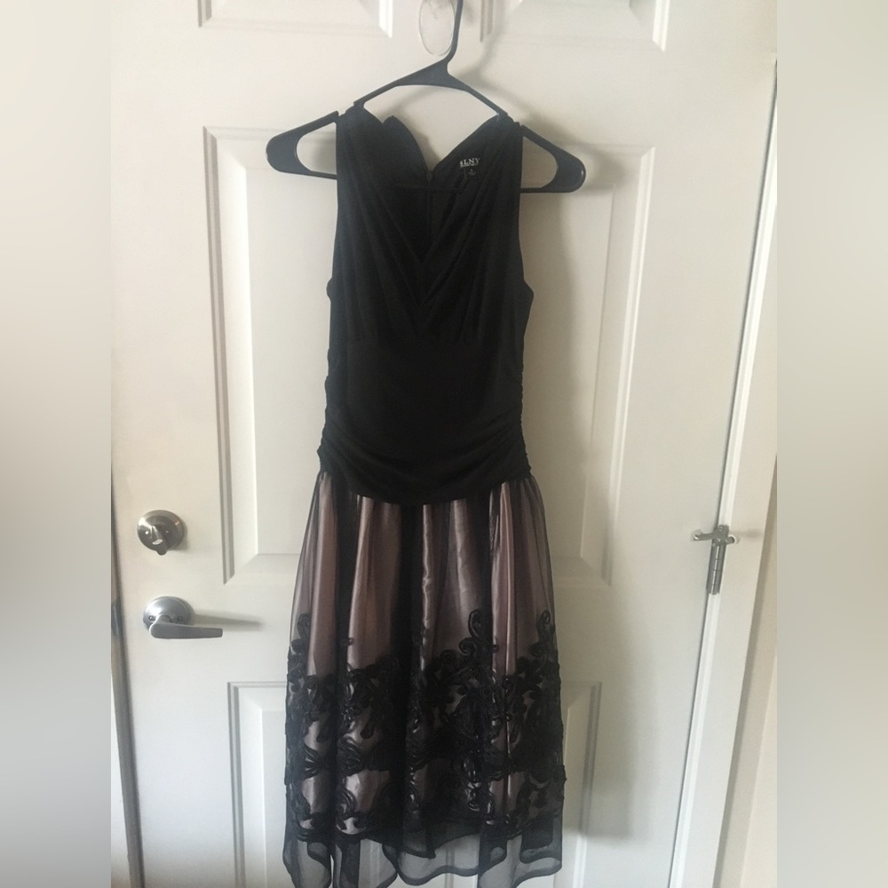 Formal evening gown size 8 blush skirt with black overlay black top with zipper